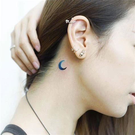 small crescent moon tattoo|simple moon tattoo behind ear.